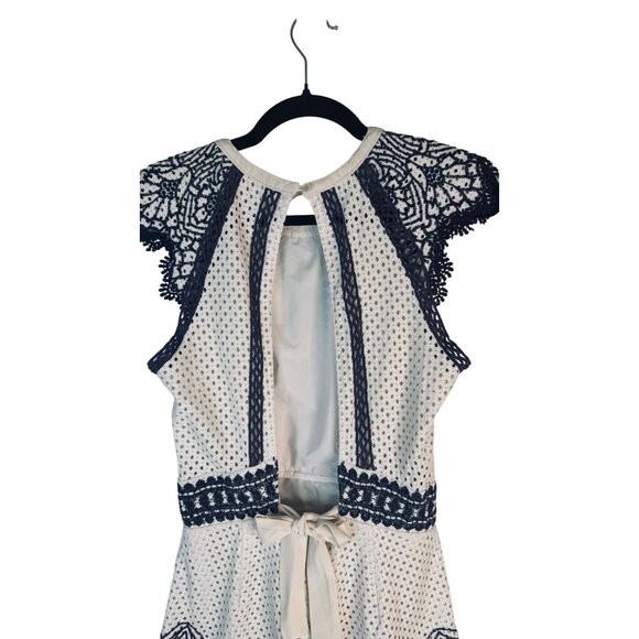 Saylor Ivory & Navy M Lace Embroidered Romper Open Back & Ribbon Tie Detail - Picture 13 of 15